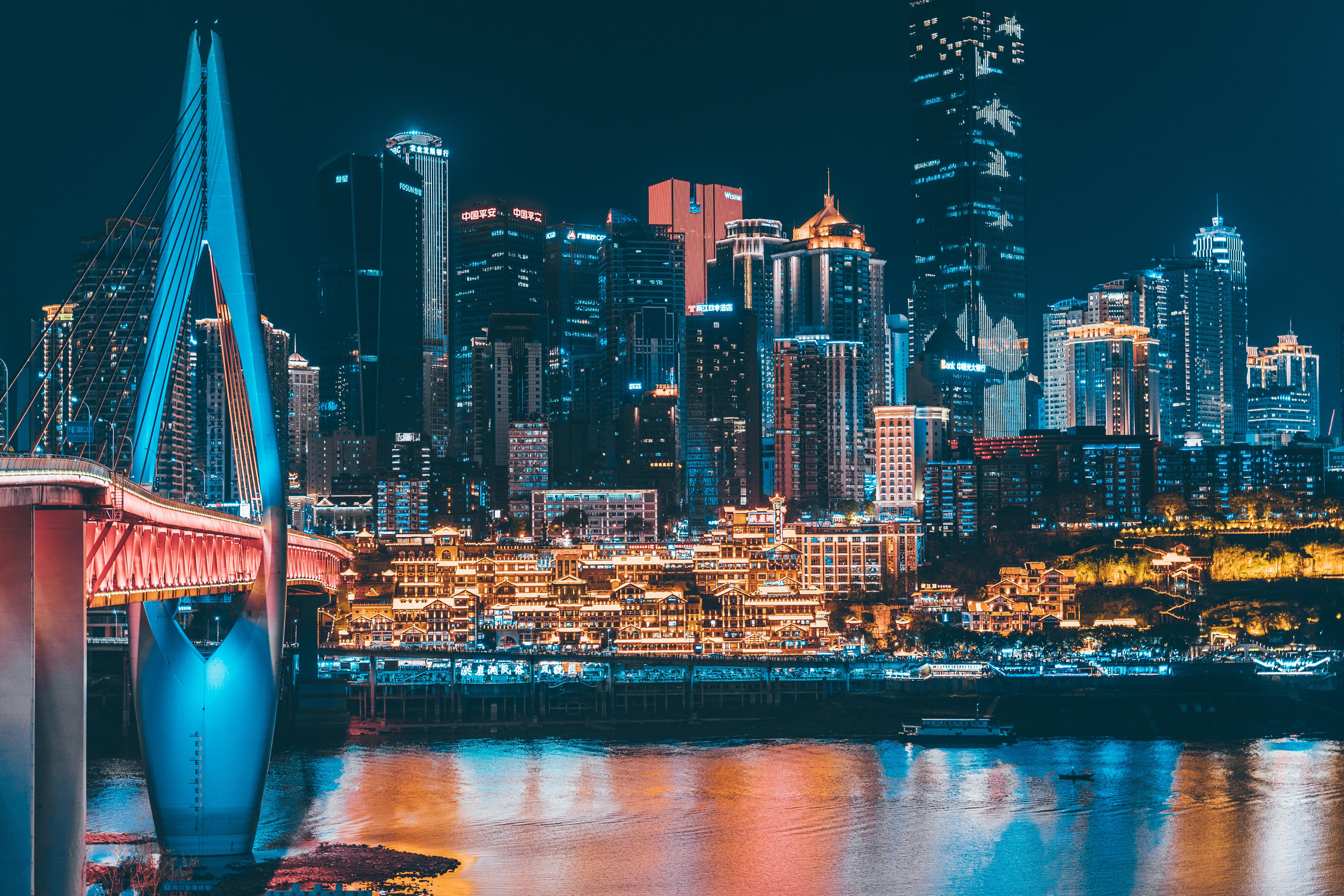 Qiansimen Bridge spanning the Jialing River in Chongqing at dusk